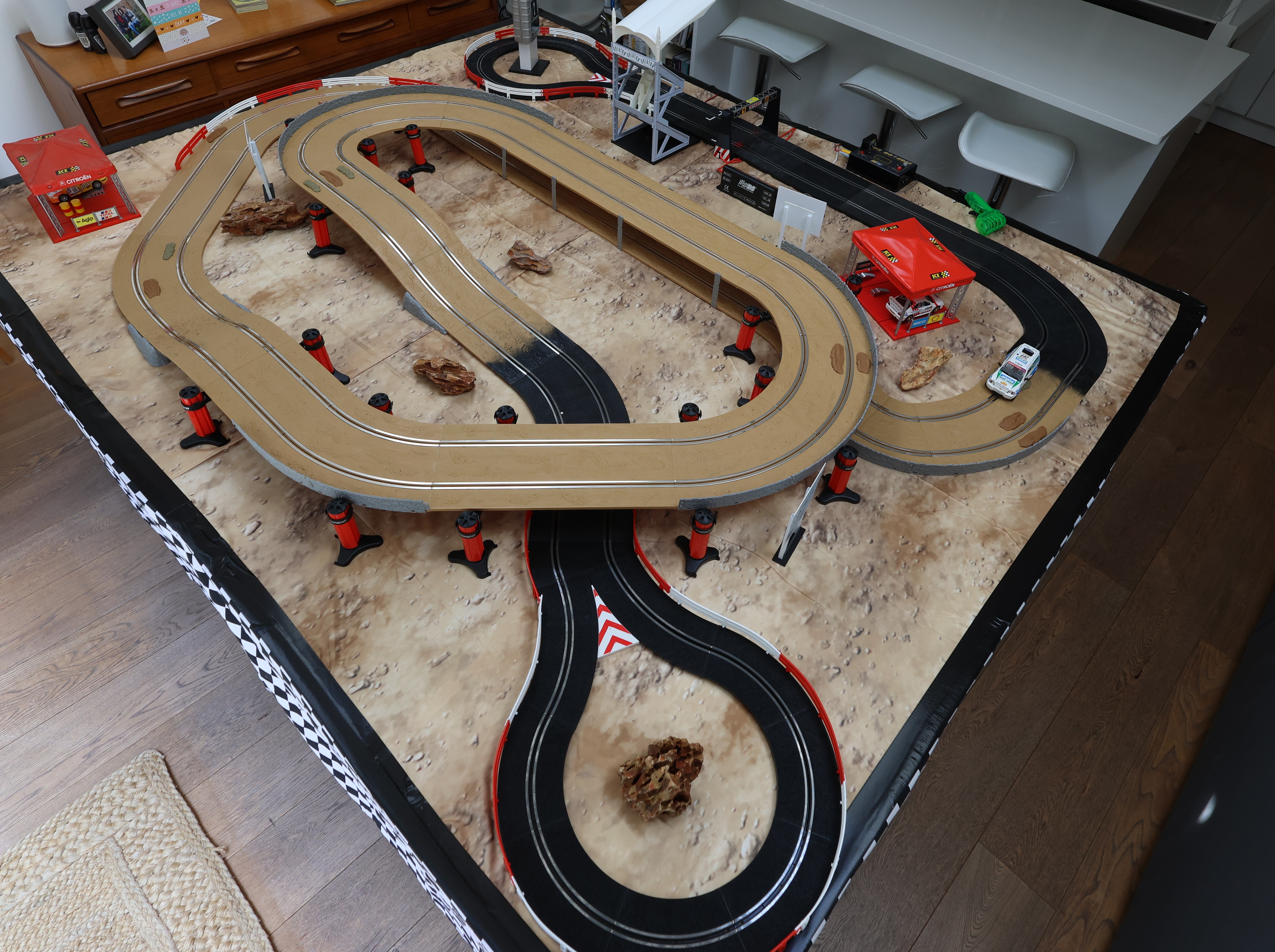 Compact off-road Scalextric track designed for a trade show or exhibition stand